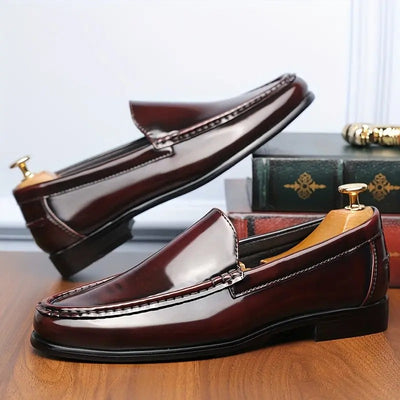 Crafted from high-quality leather, these loafers offer durability and a refined look that complements any outfit. Their flexible sole ensures all-day comfort, making them ideal for both work and casual wear.