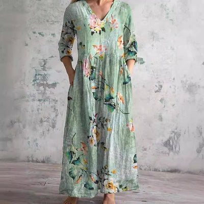 Elevate your summer wardrobe with the Dearyn Floral V-Neck Dress, featuring an elegant neckline and delicate floral patterns for timeless sophistication.