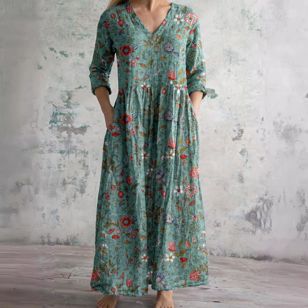 Elevate your summer wardrobe with the Dearyn Floral V-Neck Dress, featuring an elegant neckline and delicate floral patterns for timeless sophistication.