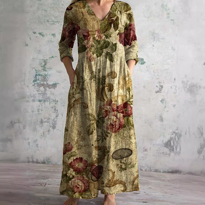 Elevate your summer wardrobe with the Dearyn Floral V-Neck Dress, featuring an elegant neckline and delicate floral patterns for timeless sophistication.