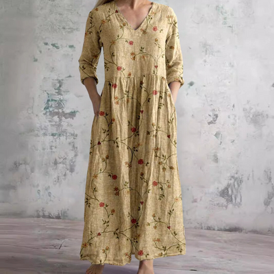 Elevate your summer wardrobe with the Dearyn Floral V-Neck Dress, featuring an elegant neckline and delicate floral patterns for timeless sophistication.